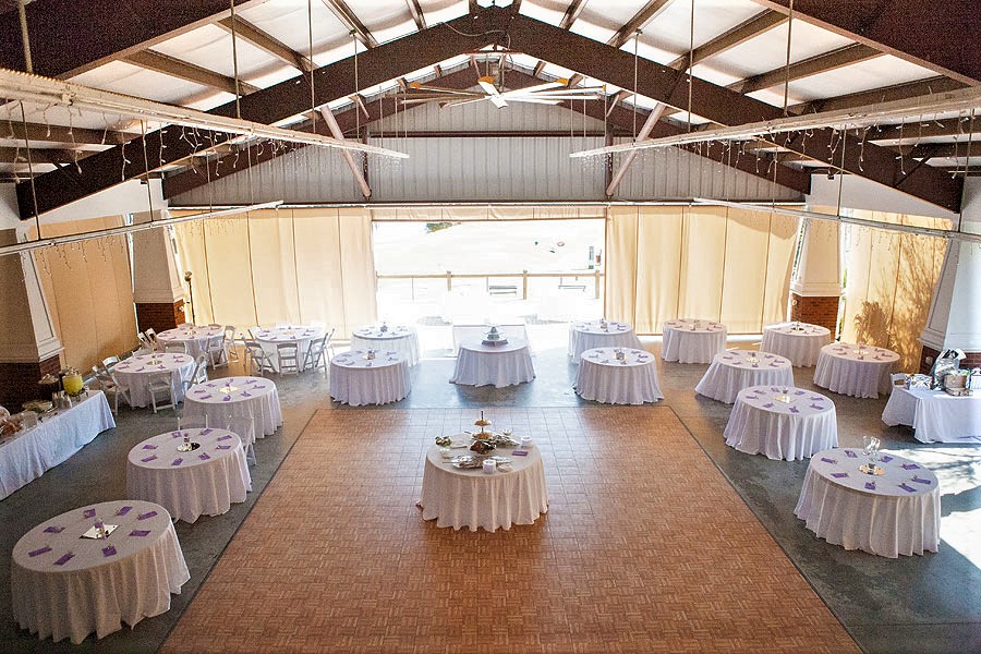 A wedding reception set under the Candlelite Pavilion.